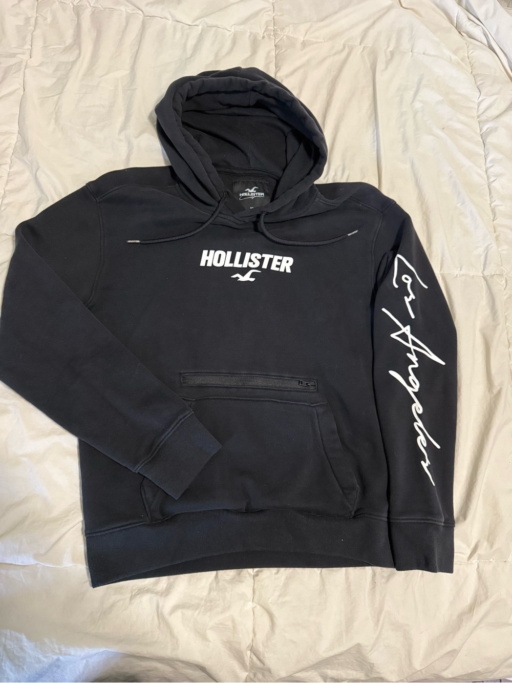 Hollister Black Pullover Hoodie with White Logo and Sleeve Script